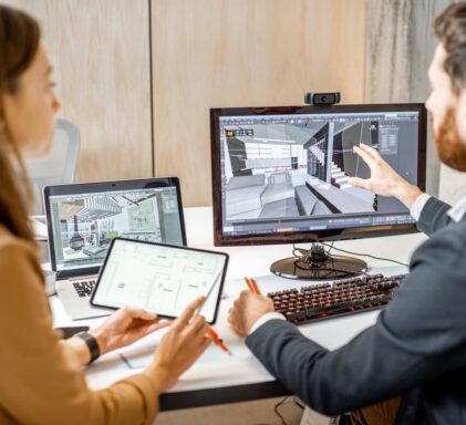 Two interior designers working in the office