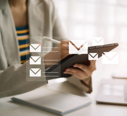 Email notification concept, women use tablet and laptop receive message alert in the mailbox.