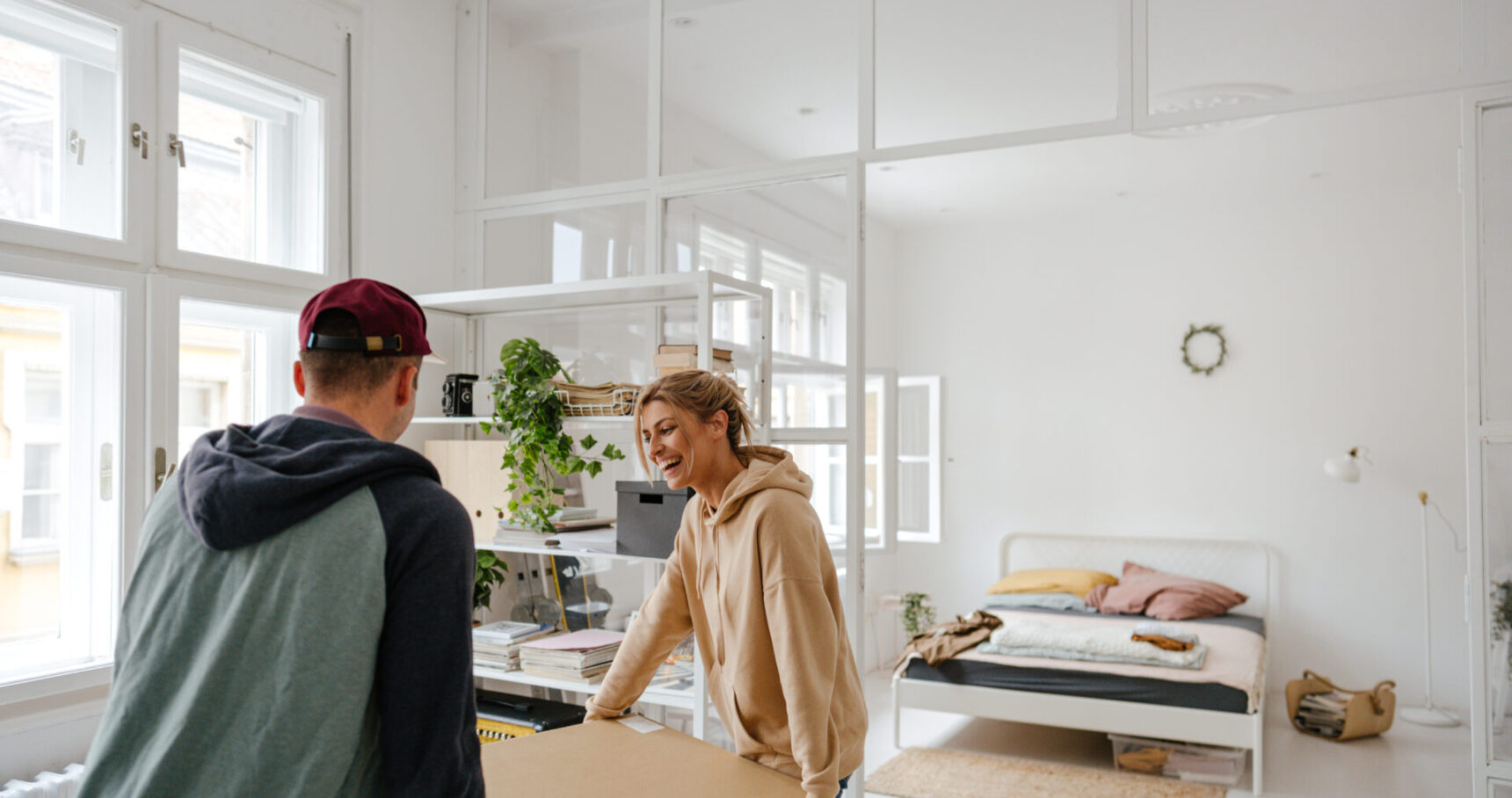 Young couple moving into a new apartment