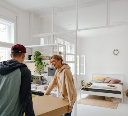 Young couple moving into a new apartment