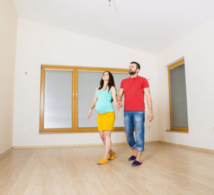 Two people self-showing a new property