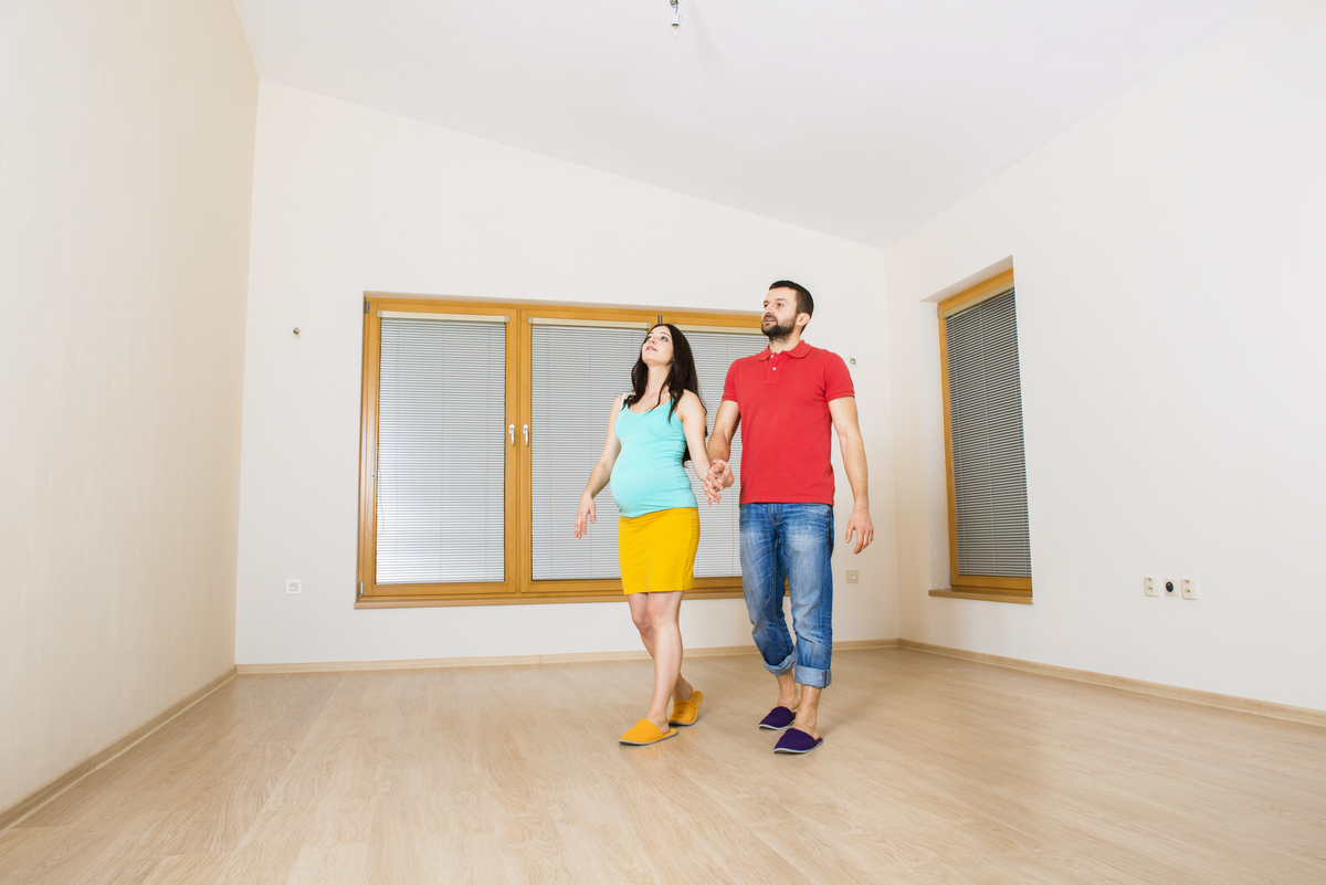 Two people self-showing a new property