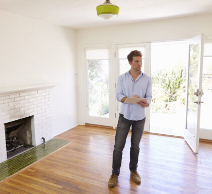 male realtor with digital tablet looking around ho 2026 01 05 22 59 54 utc